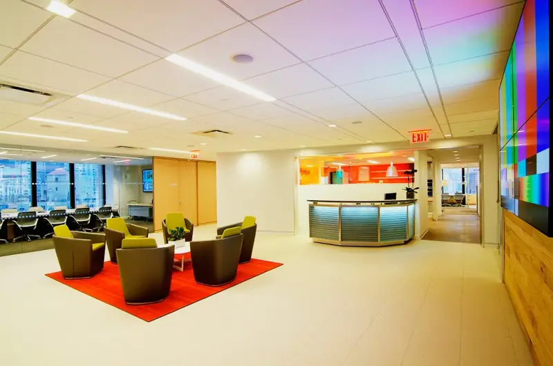 IEEE reception with backlit panels and lounge chairs