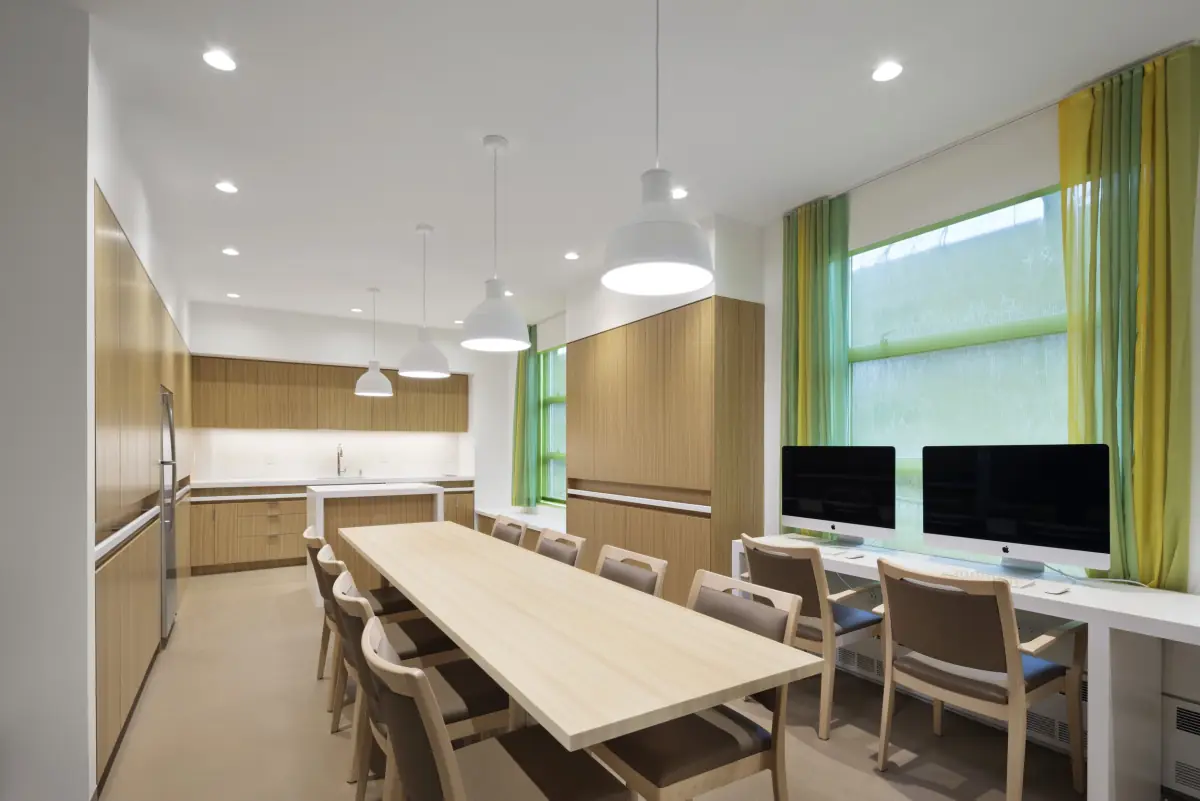 Resident dining room with long oak table